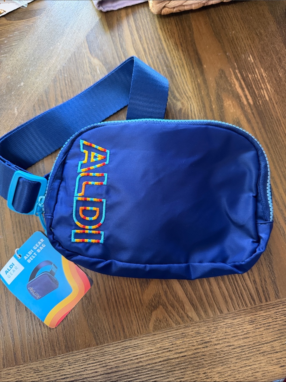 Aldi Blue Crossbody Belt Bag with Rainbow Logo